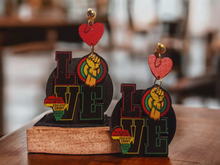 Load image into Gallery viewer, Large afrocentric profile clip on earrings Kargo Fresh
