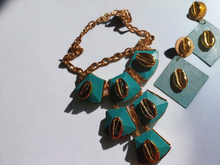 Load image into Gallery viewer, Handmade Queens Cowrie Collar and handpainted clip on earrings