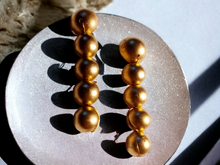 Load image into Gallery viewer, Handmade gold wood bead necklace set with clip on earrings