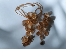Load image into Gallery viewer, Runway glam filigree metal gold flower necklace and earrings set (clip on earrings)