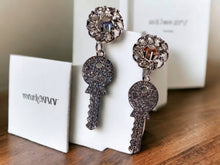 Load image into Gallery viewer, Small Handmade Silver Metal and Shiny Rhinestone Key Clip On Earrings
