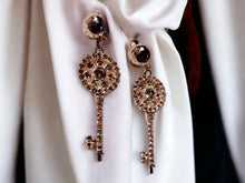 Load image into Gallery viewer, Handmade Silver Metal and Shiny Rhinestone Key Clip On Earrings