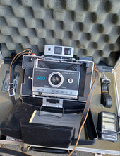 Load image into Gallery viewer, 1970s Polaroid 450 land camera with accessories Kargo Fresh
