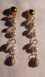 Faux pearl and cowrie shell dangle clip on earrings