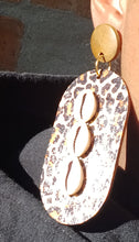 Load image into Gallery viewer, Clip on wood and cowrie animal print earrings
