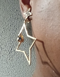 Abstract star design clip on earrings