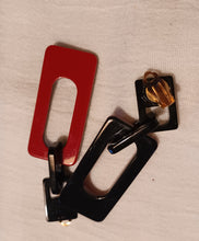 Load image into Gallery viewer, Chunky red and black acrylic clip on hoop earrings Kargo Fresh
