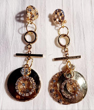 Load image into Gallery viewer, Glam gold metal multi hoop clip on earrings handmade Kargo Fresh
