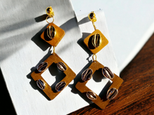 Load image into Gallery viewer, Handmade wood and cowrie clip on earrings Kargo Fresh
