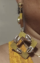 Load image into Gallery viewer, Handmade wood and cowrie clip on earrings Kargo Fresh
