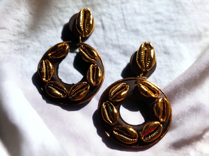 Handmade wood and cowrie hoops