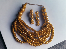 Load image into Gallery viewer, Handmade gold wood bead necklace set with clip on earrings
