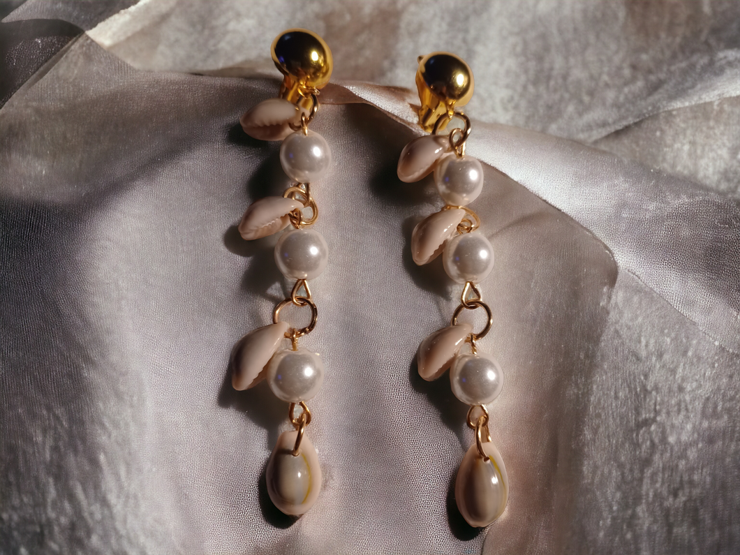 Faux pearl and cowrie shell dangle clip on earrings