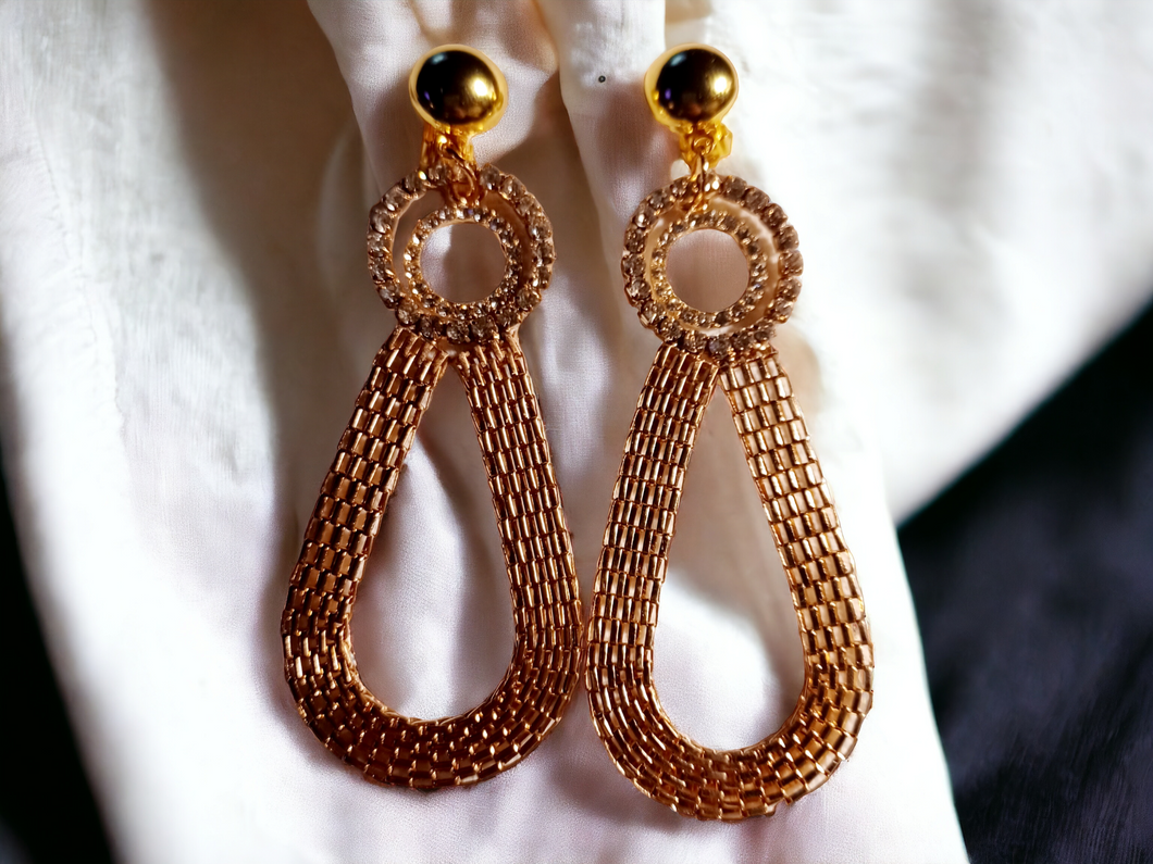 Gold metal mesh clip on earrings