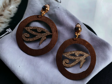 Load image into Gallery viewer, Clip on wooden eye of horus earrings
