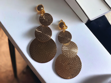 Load image into Gallery viewer, Hammered metal disc clip on earrings 2.5 inch
