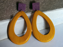Load image into Gallery viewer, Yellow and purple wood clip on hoops

