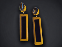 Load image into Gallery viewer, Handmade wood and cowrie clip on earrings
