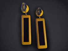 Load image into Gallery viewer, Handmade wood and cowrie earrings
