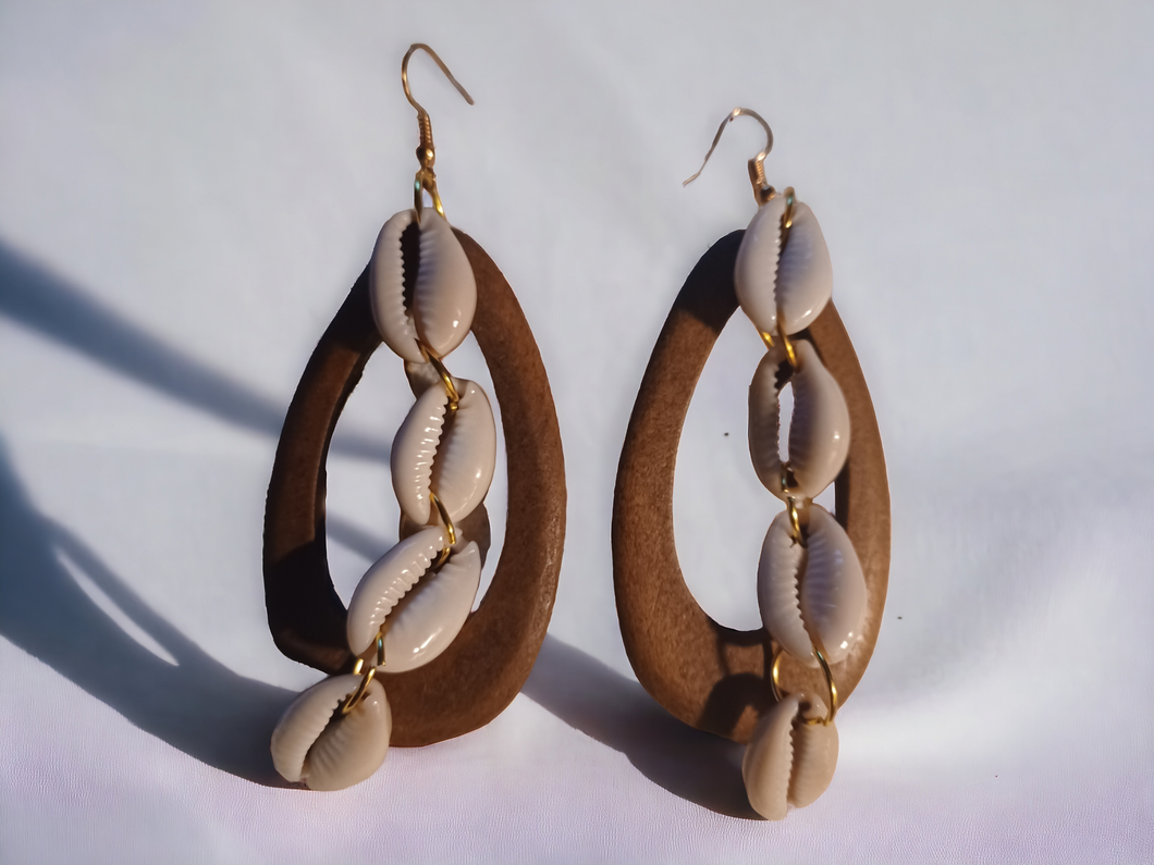 Handmade wood and cowrie hoops