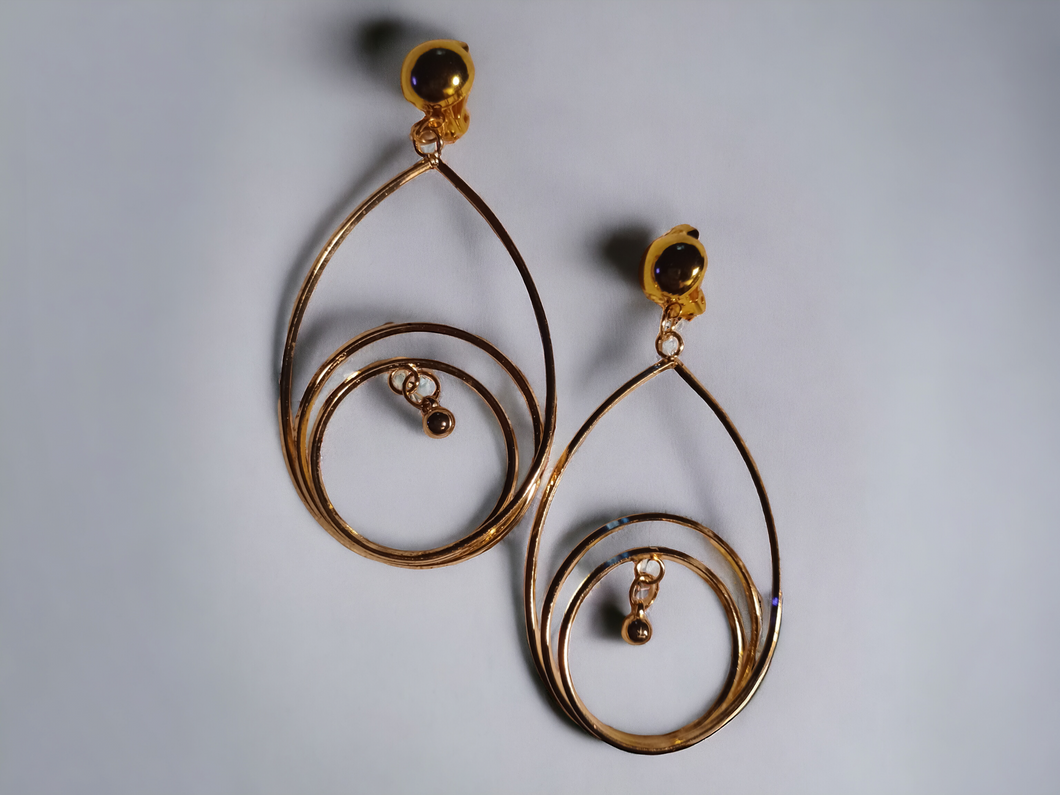 Gold metal multi hoop clip on earrings