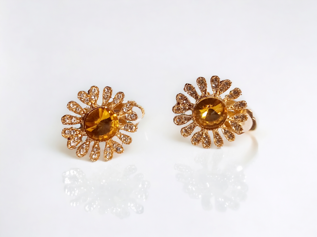 Rhinestone daisy clip on stud earrings