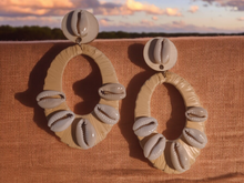 Load image into Gallery viewer, Handmade wood raffia and Cowrie clip on hoops
