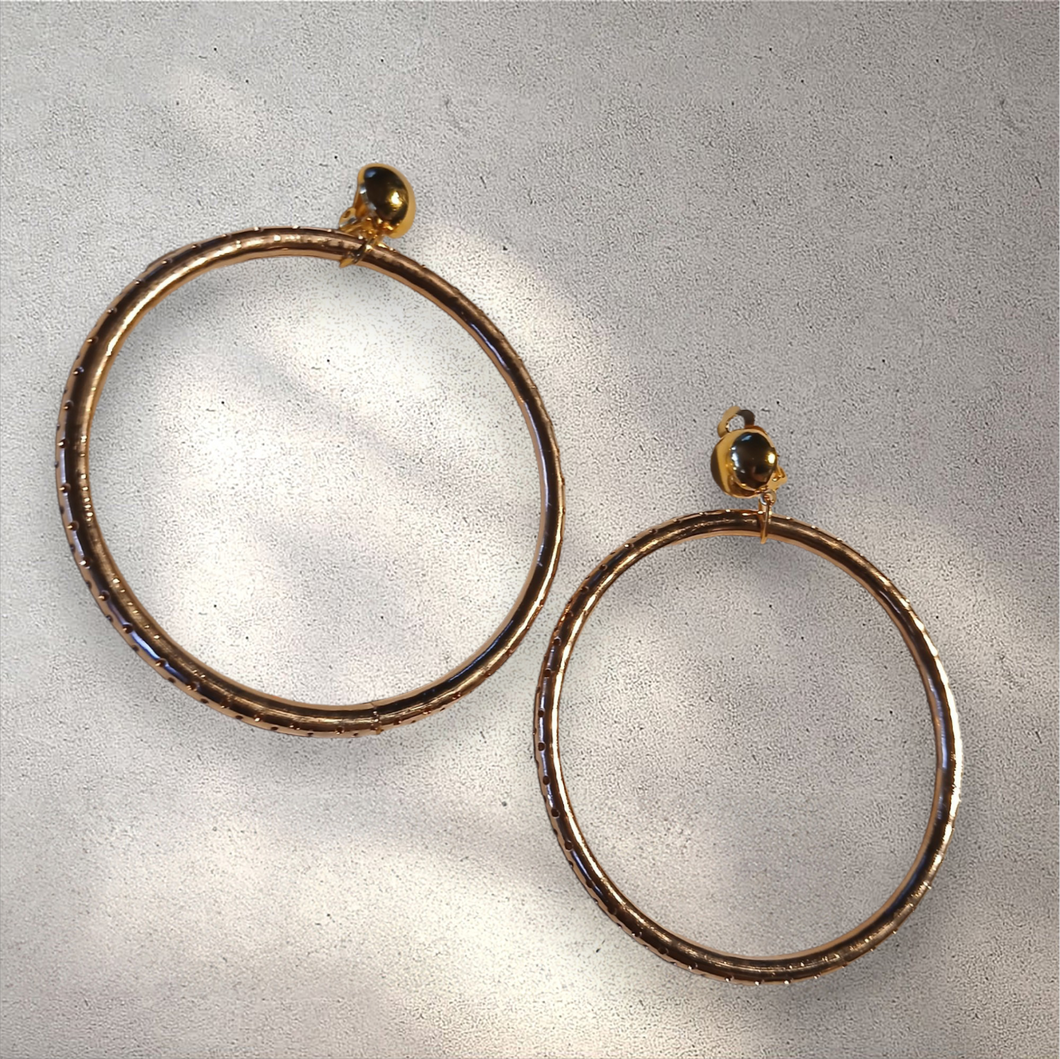 Large gold metal clip on hoops