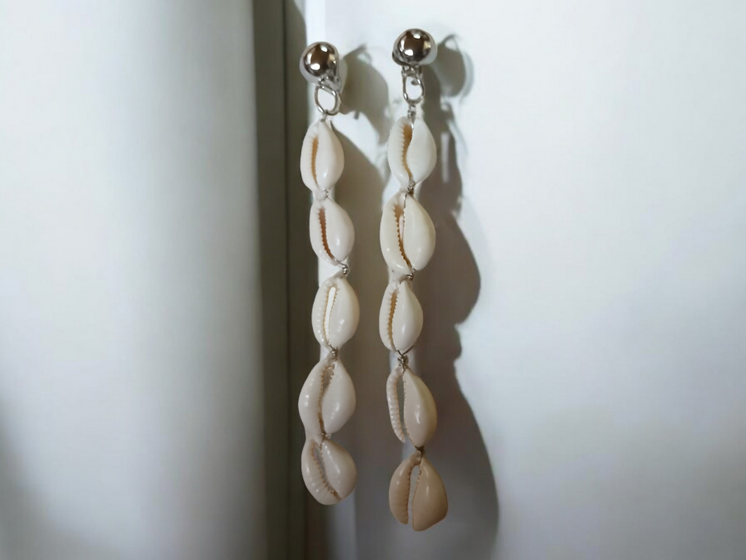 Handmade single strand cowrie clip on earrings