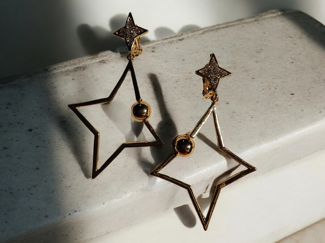 Abstract star design clip on earrings