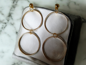 Gold metal multi hoop clip on earrings