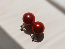 Load image into Gallery viewer, Rare red large faux pearl clip on studs
