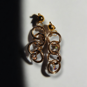 Gold metal multi hoop clip on earrings