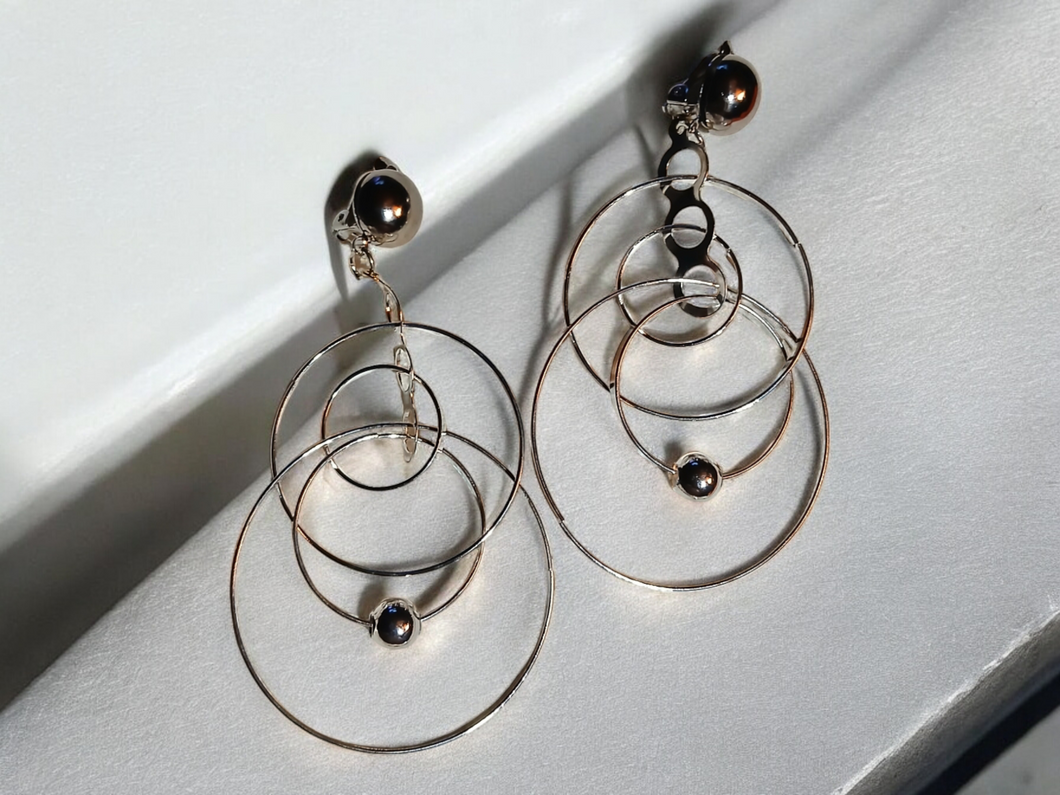 Silver metal multi hoop clip on earrings