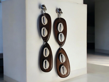 Load image into Gallery viewer, Handmade large wood and cowrie clip on earrings
