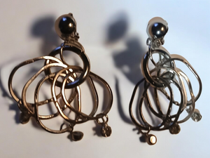 Abstract silver metal multi hoop clip on earrings