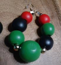 Load image into Gallery viewer, Chunky Rbg Red black and green wooden ball hoop Earrings
