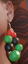 Load image into Gallery viewer, Chunky Rbg Red black and green wooden ball hoop Earrings
