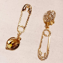 Load image into Gallery viewer, Blingy Pop art Safety pin Clip On Earrings gold
