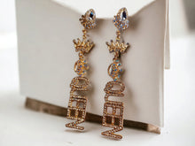 Load image into Gallery viewer, Handmade rhinestone and Gold Metal Queen Nameplate Earrings Clip on 4.5 inch
