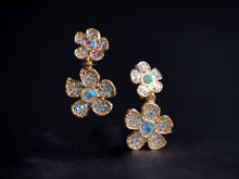 Load image into Gallery viewer, Small Rhinestone Daisy Clip On Earrings 1.5 inch gold/Aurora borialis
