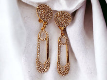 Load image into Gallery viewer, Blingy Pop art Safety pin Clip On Earrings gold
