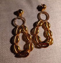 Load image into Gallery viewer, Handmade Gold Metal Hoop and Cowrie Shell Clip On Earrings
