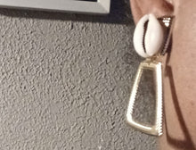 Load image into Gallery viewer, Small Hammered Gold Metal and cowrie shell Clip On Earrings
