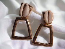Load image into Gallery viewer, Small Hammered Gold Metal and cowrie shell Clip On Earrings
