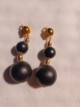 Load image into Gallery viewer, Handmade boho Ball Dangle Clip On Earrings black and gold 2 inch

