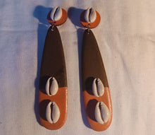 Load image into Gallery viewer, Handmade  handpainted cowrie and Wood Clip On Dangle Earrings 6 inch
