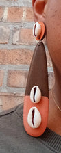 Load image into Gallery viewer, Handmade  handpainted cowrie and Wood Clip On Dangle Earrings 6 inch
