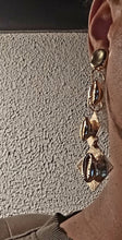 Load image into Gallery viewer, Handmade Abstract gold metal and cowrie Clip On Dangle Earrings
