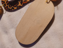 Load image into Gallery viewer, Handmade Wood and Cowrie Animal Print Clip On Earrings
